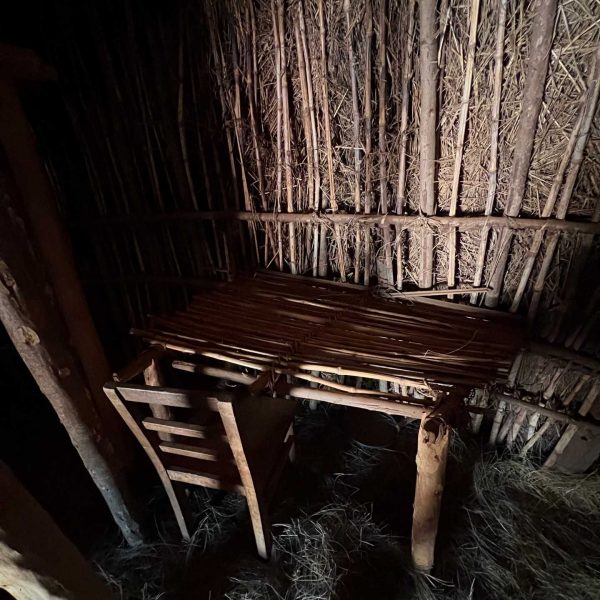 Interior of tribal cottage in Burundi. A riot with the Royal Drummers and Batwas of Burundi