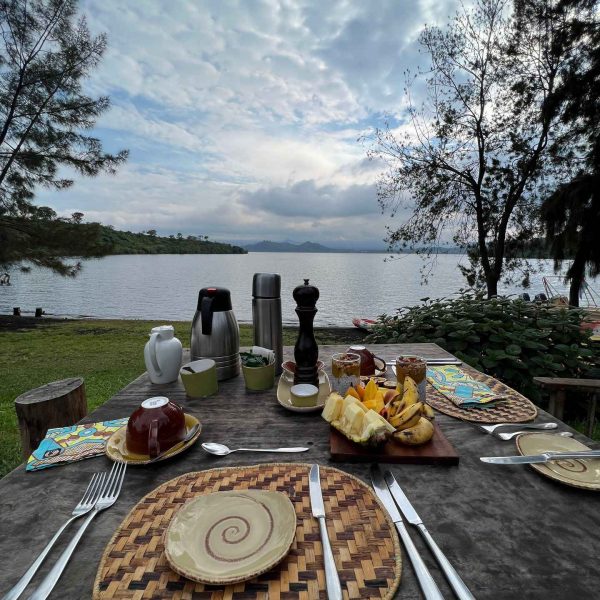 Set table by the lake in Musanze, Rwanda. Climbing Mt Bisoke