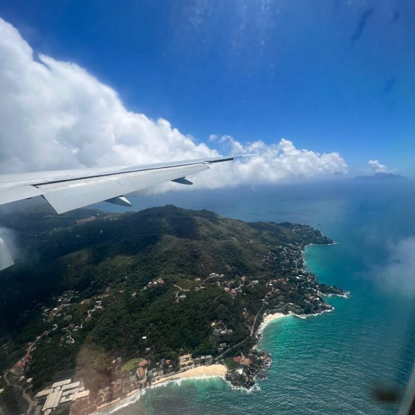 Plane window view of Seychelles. Seychelles, Vallée De Mai and Anse Lazio