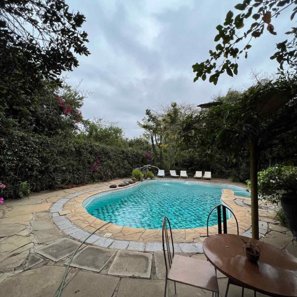 Swimming pool at Macushla House in Nairobi, Kenya. Drone issues & the largest urban slum in Africa