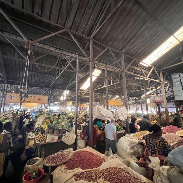 People at the market in Kigali, Rwanda. The Rwandan genocide & a toothache