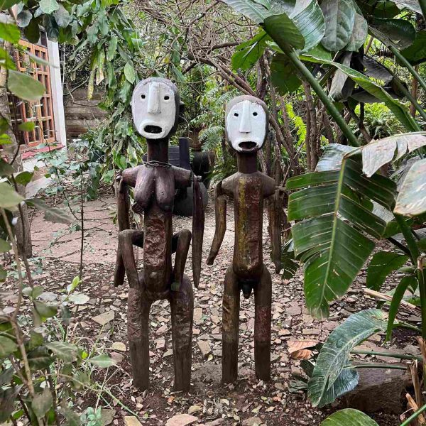 Couple sculpture in the garden at Macushla House in Nairobi, Kenya. Drone issues & the largest urban slum in Africa