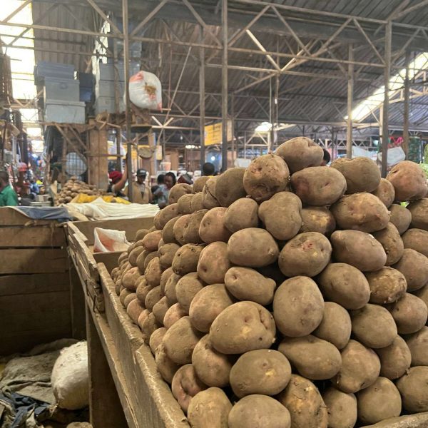 Potato stall at market in Kigali, Rwanda. The Rwandan genocide & a toothache