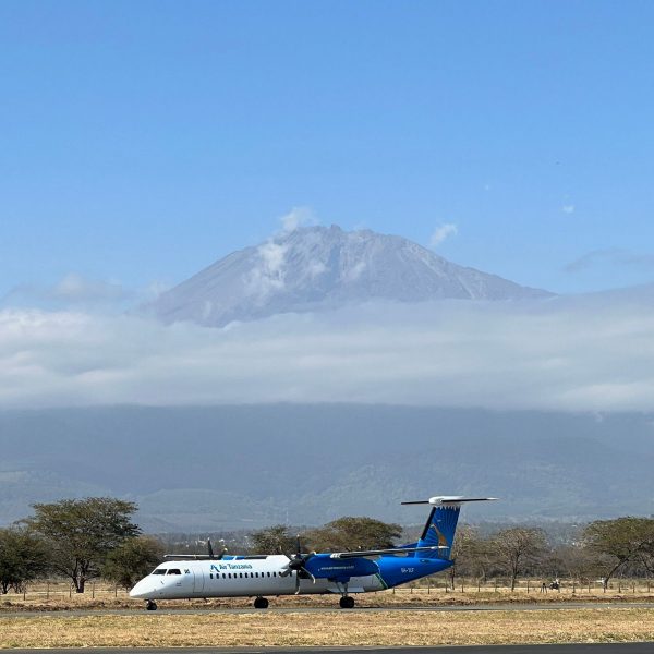 Plane landing at Arusha airport in Zanzibar, Tanzania. Arriving into Zanzibar