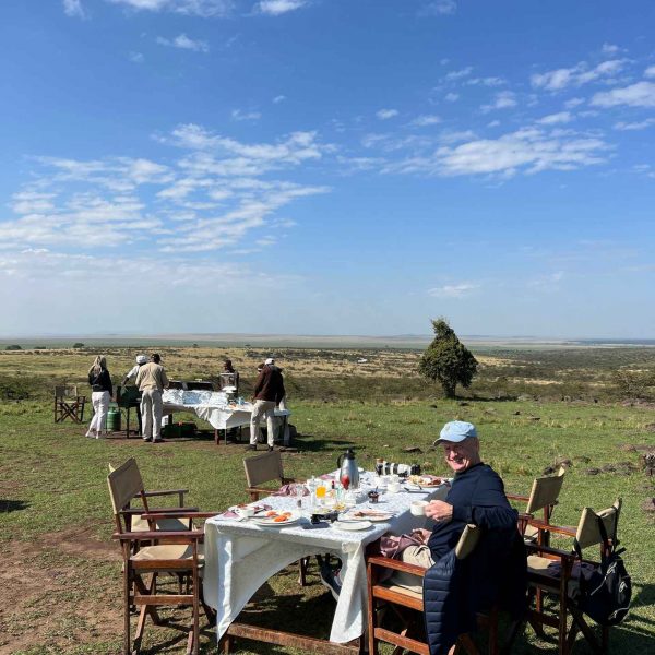 Dad at bush breakfast in Masai Mara, Kenya. The Great Migration