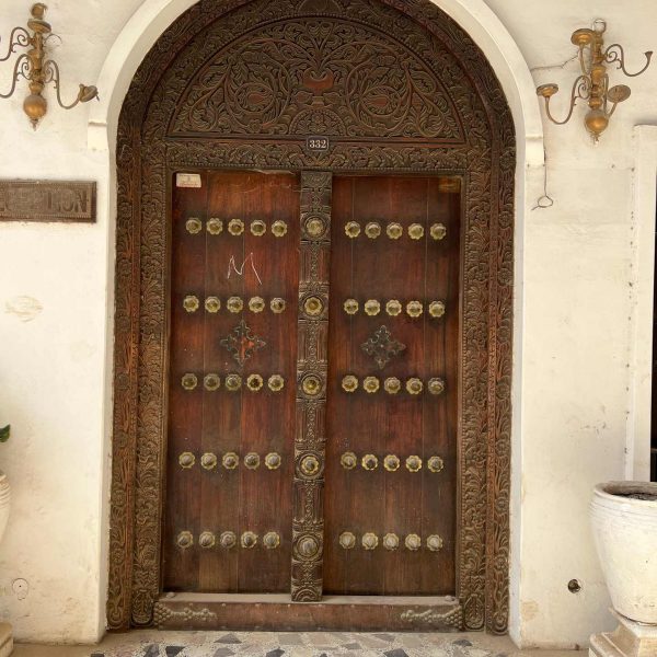Antique wooden door in Stone Town, Tanzania. Prison Island & Stone Town