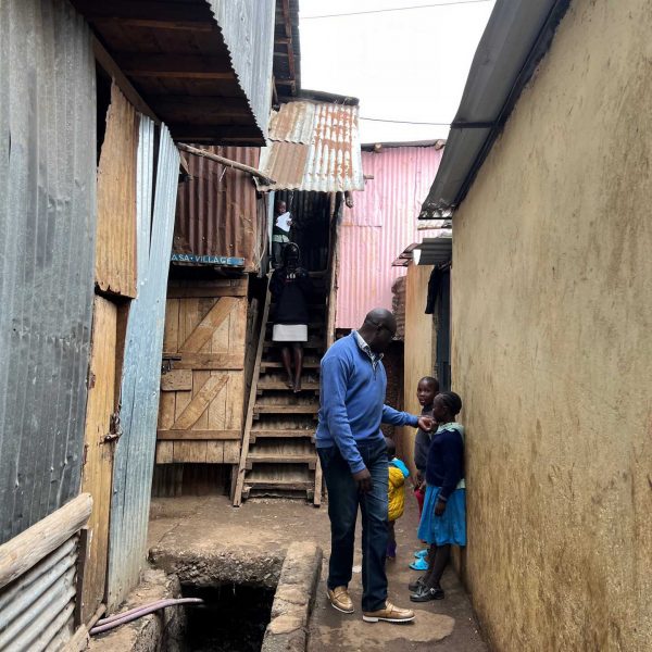Locals at slums in Nairobi, Kenya. Drone issues & the largest urban slum in Africa
