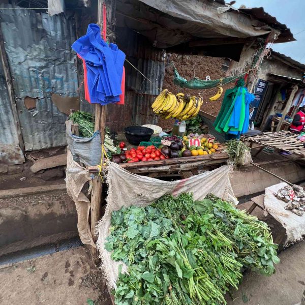 Vegetables stall at slums in Nairobi, Kenya. Drone issues & the largest urban slum in Africa