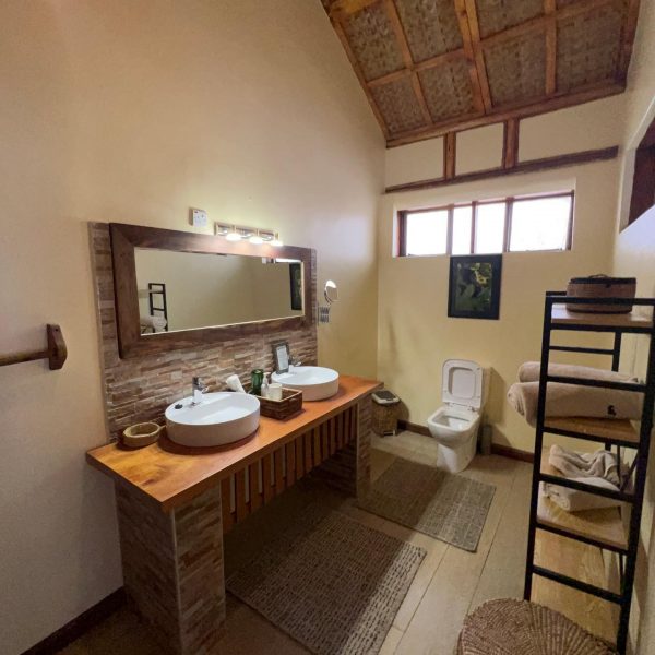 Bathroom accommodations at Gahinga Lodge in Uganda. Sh*t scared at the Gorilla habituation experience
