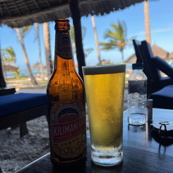 Bottle of beer at Breezes resort in Zanzibar, Tanzania. Arriving into Zanzibar