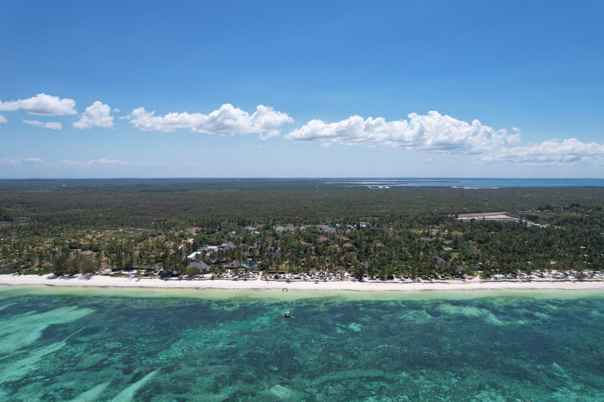 Aerial view of beach in Zanzibar, Tanzania. Arriving into Zanzibar