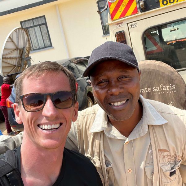 David Simpson and local guide in Tanzania. The Serengeti