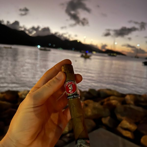 Having a cigar at sunset in Anse Source D_Argent, Seychelles. The best beach in the World & rip drone