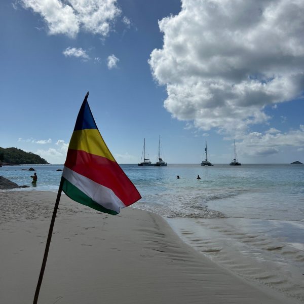 Flag at the beach in Seychelles. Seychelles, Vallée De Mai and Anse Lazio