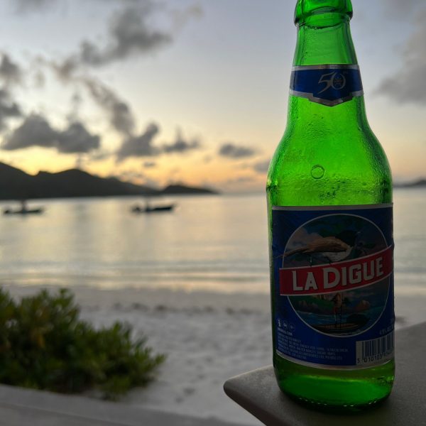 Bottle of beer at the beach in Seychelles. Seychelles, Vallée De Mai and Anse Lazio