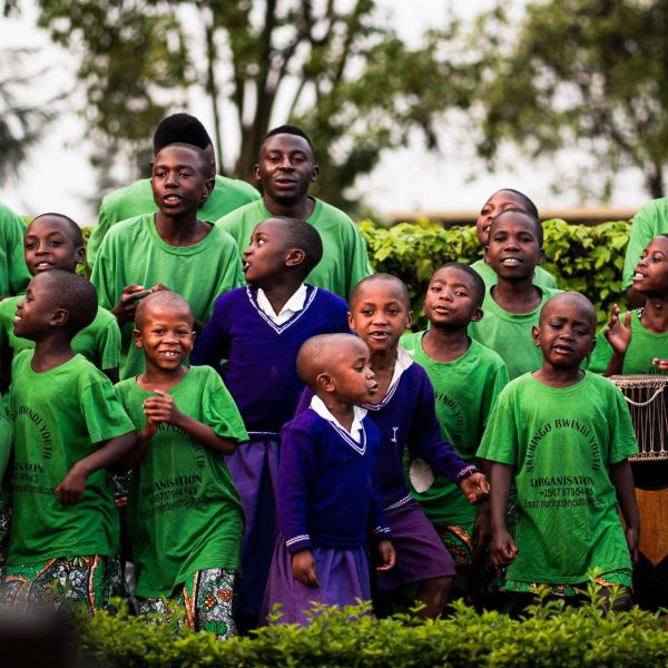Kids performing at Gahinga Lodge in Uganda. Sh*t scared at the Gorilla habituation experience