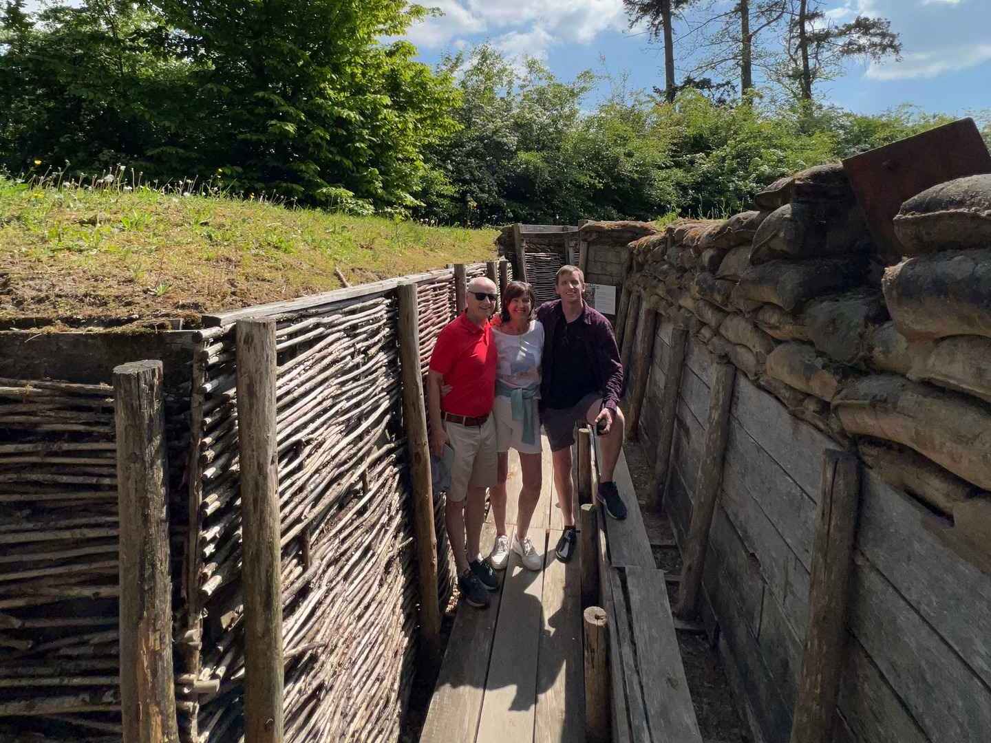 David Simpson with mom and dad inside trench in Passchendaele Museum in France. 10 must sees of Normandy & The Western Front