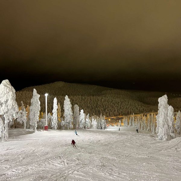 Night skiers in Ruka, Finland. Reindeer yoga, vengeance & NYE