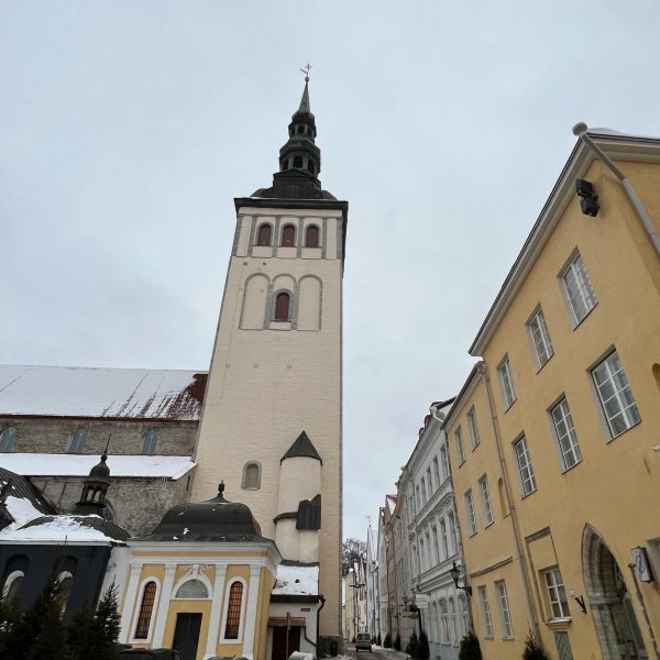 Buildings and church steeple in Tallinn, Estonia. Day trip to magical Tallinn