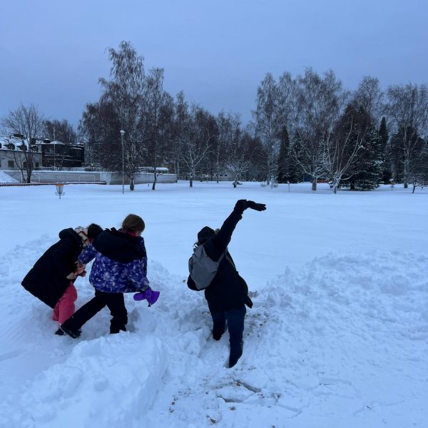 Nieces playing in the snow in Kemi, Finland. The Polar Explorer Icebreaker, Sweden