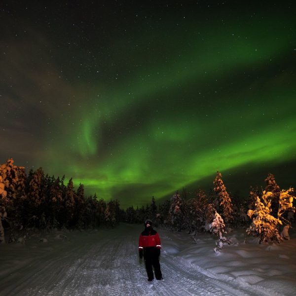 Dad and the northern lights in Rovaniemi, Finland. Christmas Day in Lapland