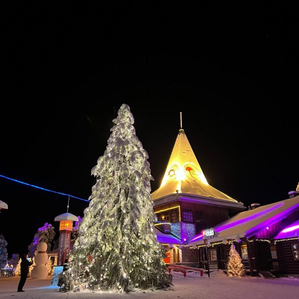 Christmas tree at night in Rovaniemi, Finland. Christmas Day in Lapland