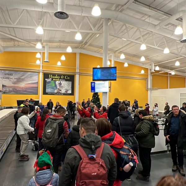 People queueing at airport customs in Ivalo, Finland. The truth about Kakslauttanen Arctic resort