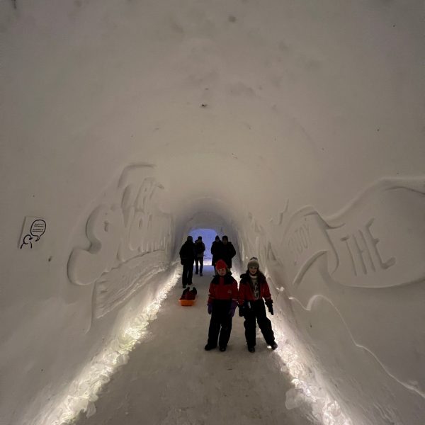 Nieces at ice corridor in Rovaniemi, Finland. Christmas Day in Lapland