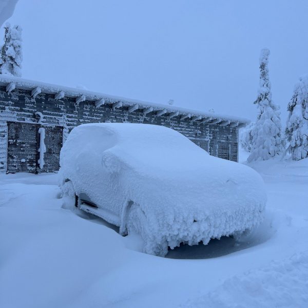 Snow covered car in Ruka, Finland. Reindeer yoga, vengeance & NYE