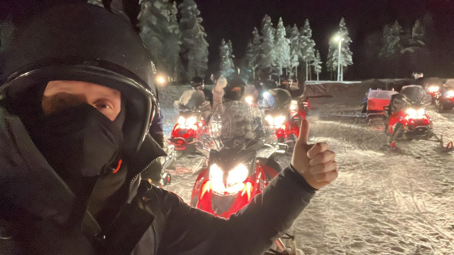 David Simpson and other hotel guests riding snow mobiles in Ivalo, Finland. The truth about Kakslauttanen Arctic resort