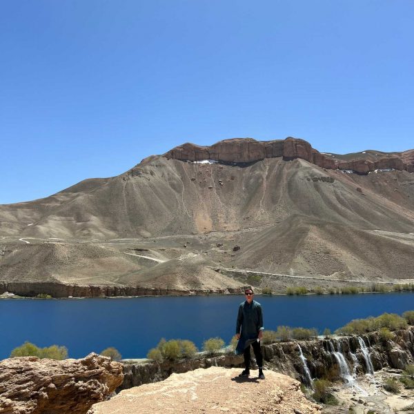 David SImpson by the mountains and lake in Bamiyan, Afghanistan. Bamiyan, Qlukhi & The Buddhas
