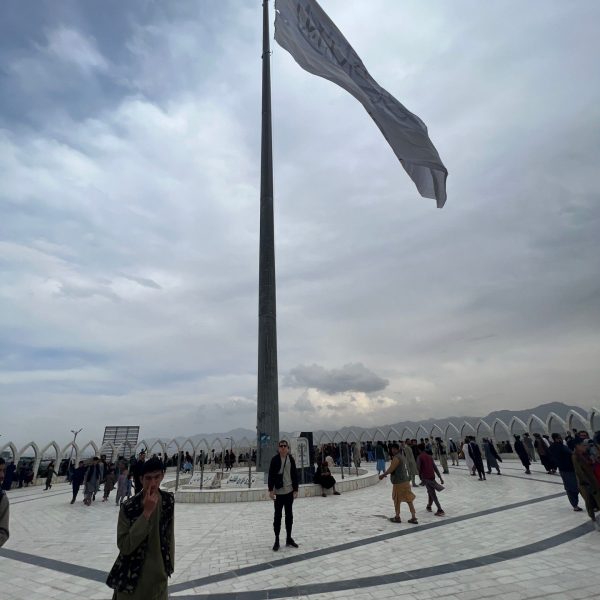 Flag ceremony in Kabul, Afghanistan. Crazy friday flag with Afghan locals