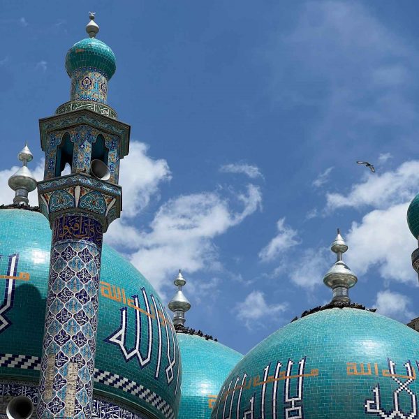 Mosque domes and minaret in Kabul, Afghanistan. Reprimanded by the Taliban