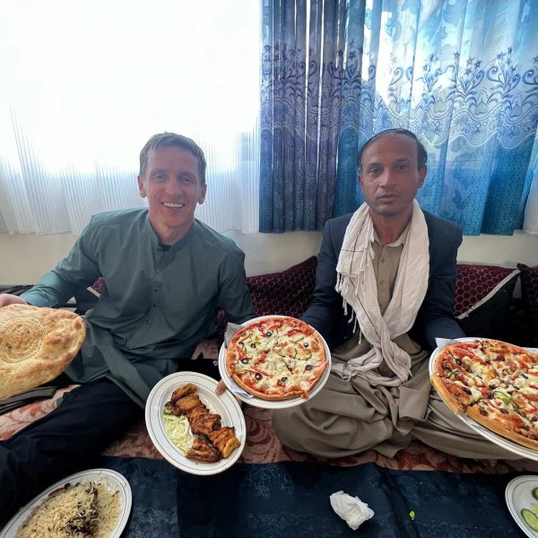 David Simpson and local guy with local food in Bamiyan, Afghanistan. Bamiyan, Qlukhi & The Buddhas