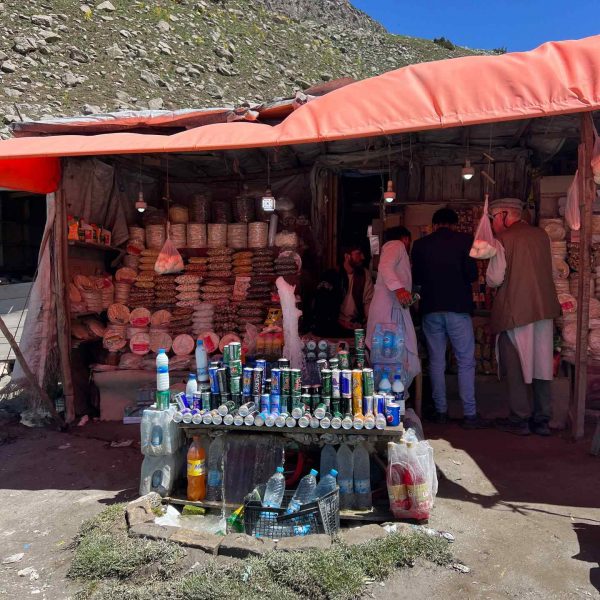Concenience store with local people buying in Mazar, Afghanistan. Body search, Soviet exploits & The Salang Pass