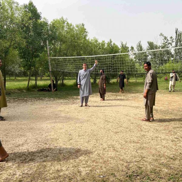 David Simpson playing volleyball with local people in Mazar, Afghanistan. Playing volley ball with the Taliban