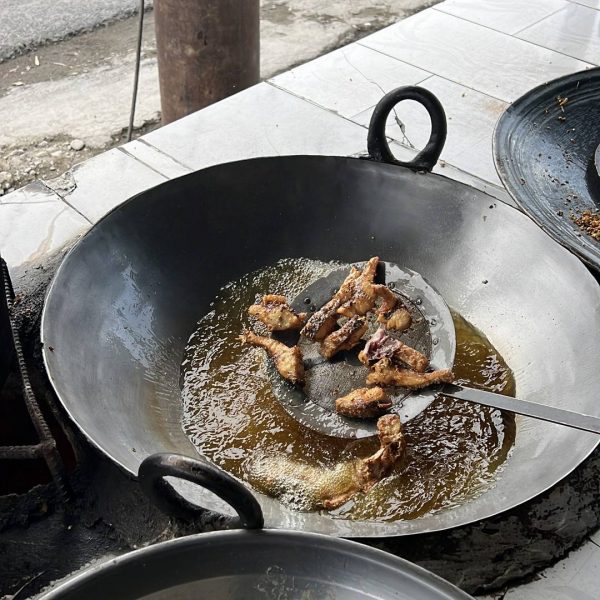 Food cooking in the wok in Jalalabad, Afghanistan. Worst food poisoning, Jalalabad