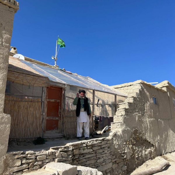Local guy standing by his house in Bamiyan, Afghanistan. Bamiyan, Qlukhi & The Buddhas