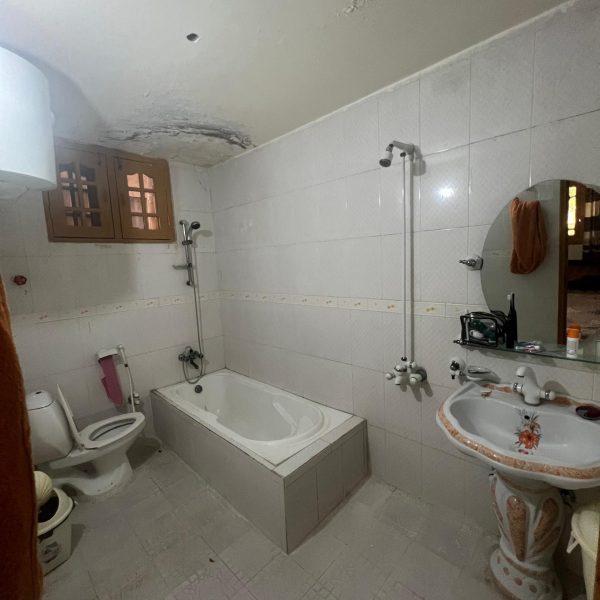 Hotel bathroom accommodations in Kandahar, Afghanistan. Sandstorm, bricks & cramps; Kabul to Kandahar