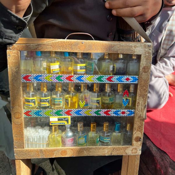 Local cologne vendor in Mazar, Afghanistan. Body search, Soviet exploits & The Salang Pass