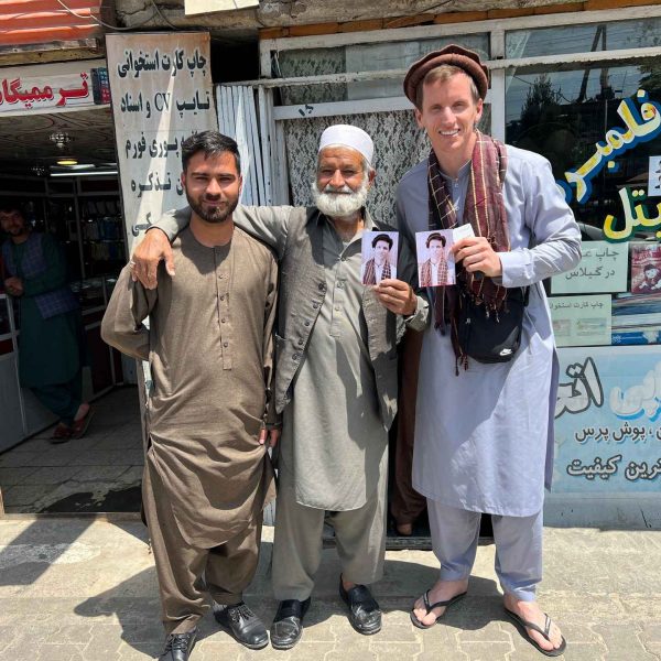 David Simpson and local box cameraman and son in Kabul, Afghanistan. Box camera and Afghan theme park