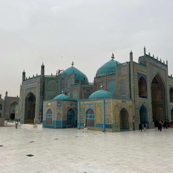 Mosque on a cloudy day in Mazar, Afghanistan. Playing volley ball with the Taliban