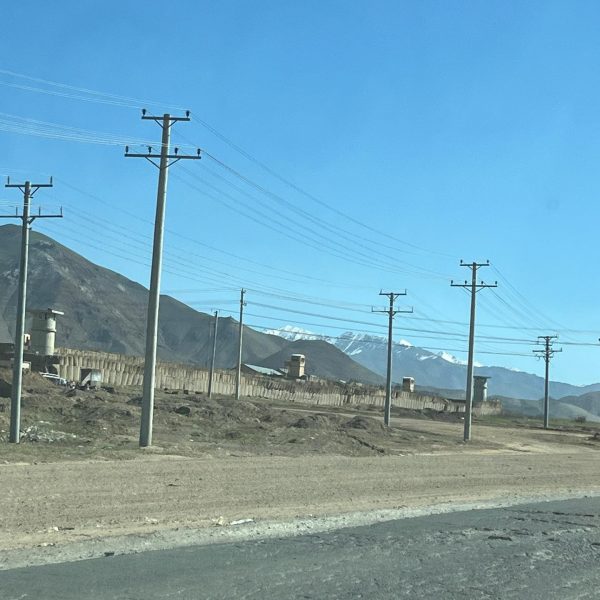 Powerlines near the highway in Mazar, Afghanistan. Body search, Soviet exploits & The Salang Pass