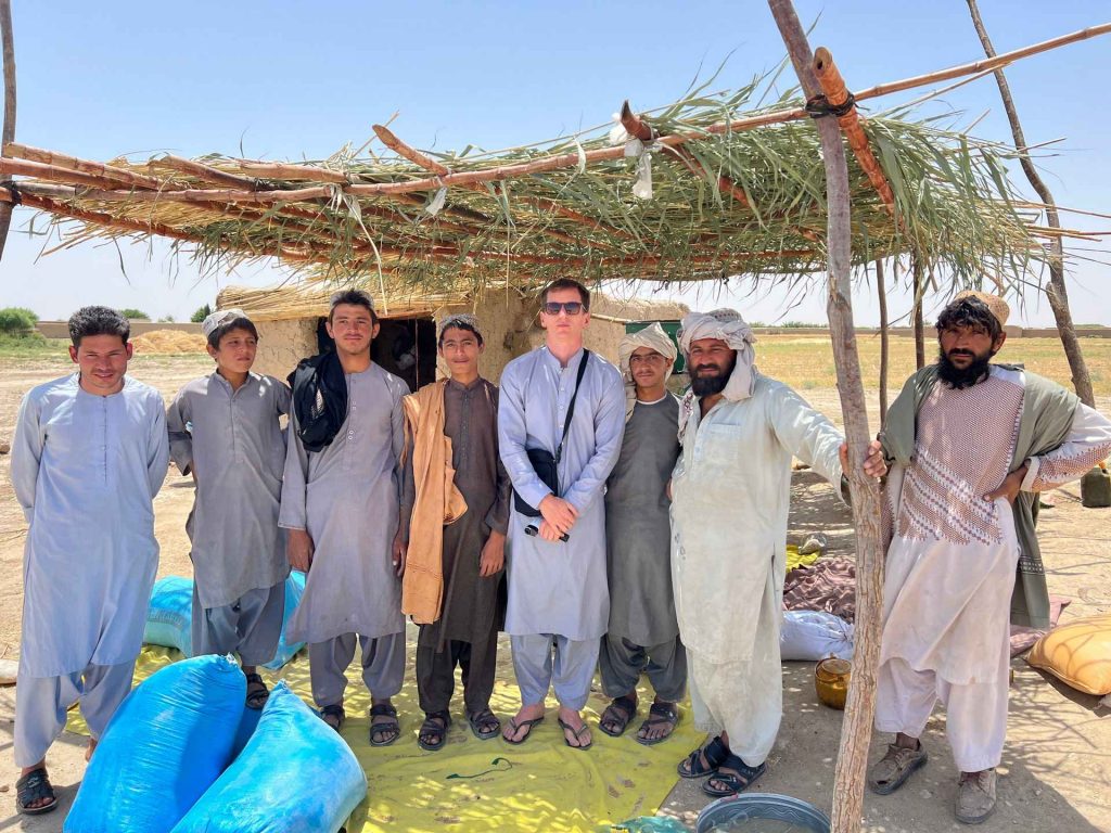 David Simpson and locals in Helmand, Afghanistan. Flour mill, super noodles and the Afghan Ring road