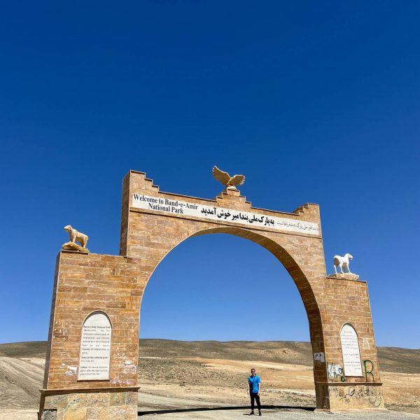 David Simpson by the welcome arch in Bamiyan, Afghanistan. Bamiyan, Qlukhi & The Buddhas