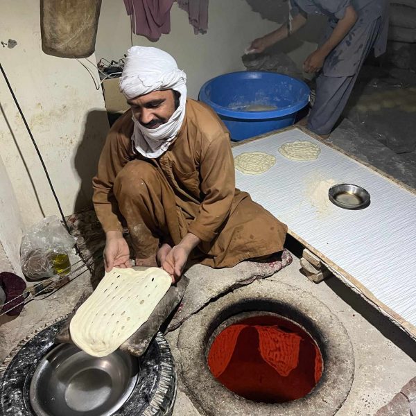 Local baker in Helmand, Afghanistan. Flour mill, super noodles and the Afghan Ring road