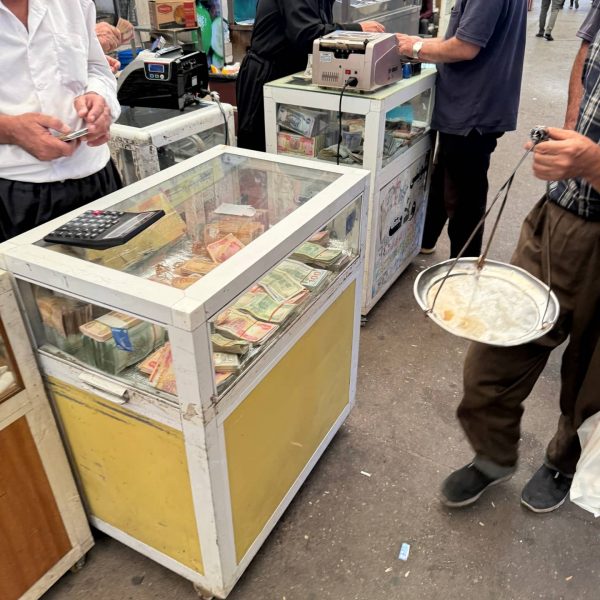 Money changer at Erbil market in Iraq. Saddam's torture house, Erbil & Sulaymaniyah