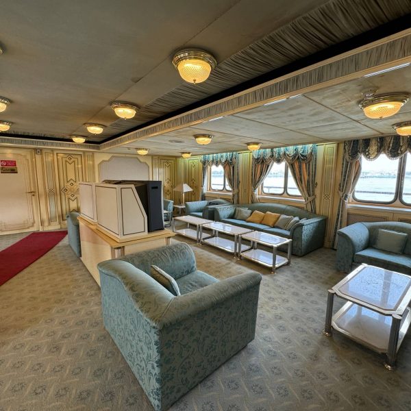 Small lounge area of Basrah Breeze in Iraq. Private tour of Saddam's yacht