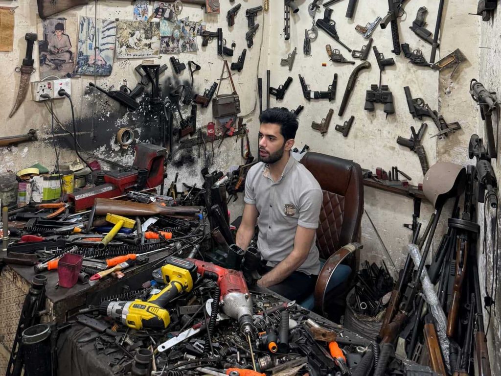Gunsmith at gun market at Erbil in Iraq. Saddam's torture house, Erbil & Sulaymaniyah