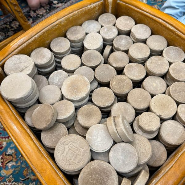 Clay turbah tablets at Imam Ali shrine in Iraq. World’s largest cemetery & sweets
